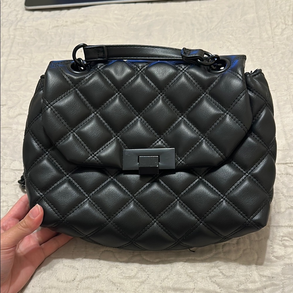 Black Shoulder Bag with Quilted Design and Plush Shape